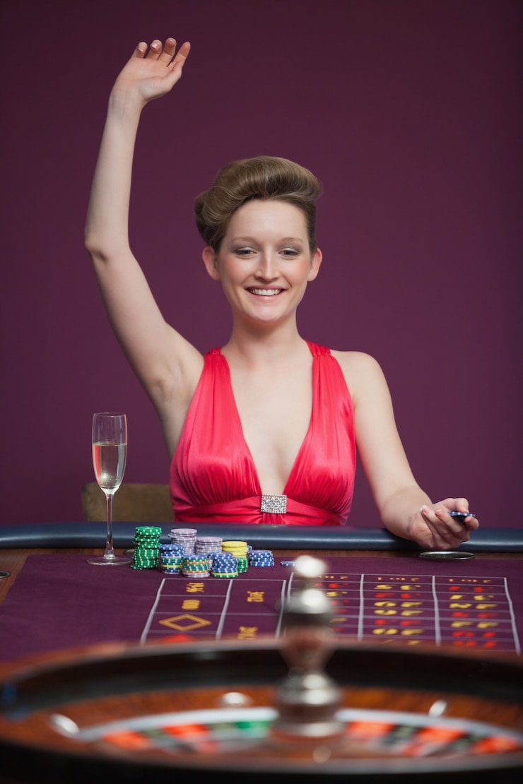 Caribbean Stud Poker hand display on rajatoto slot with dealer cards and payout table